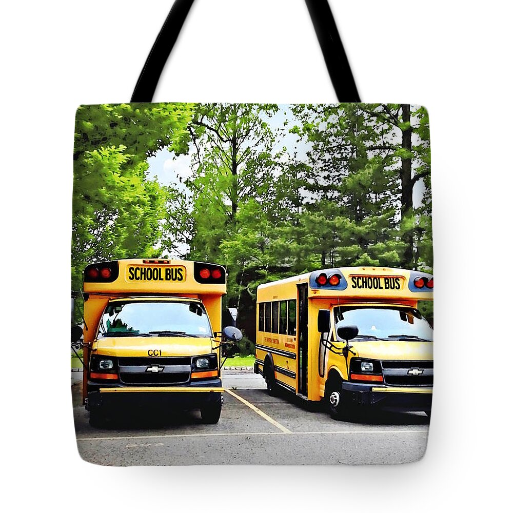 Bus Tote Bag featuring the photograph Two Yellow School Buses by Susan Savad