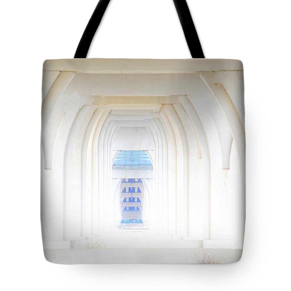Bridge Tote Bag featuring the photograph Under the Bridge by Merle Grenz