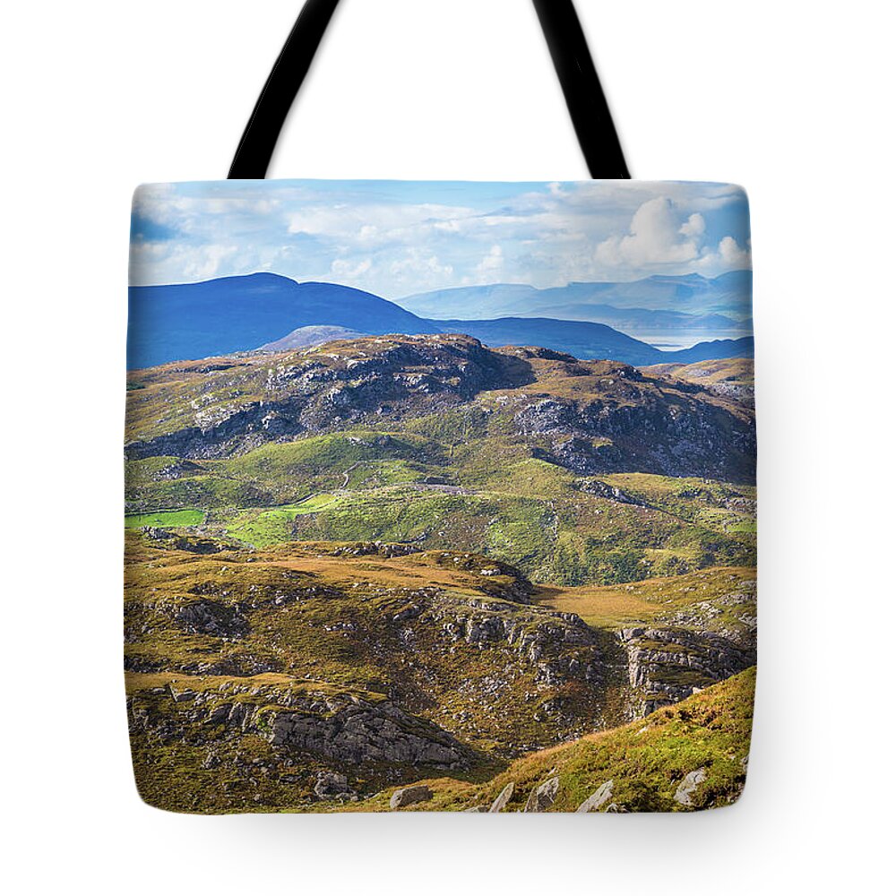 Blue Tote Bag featuring the photograph Undulating landscape in Kerry in Ireland by Semmick Photo