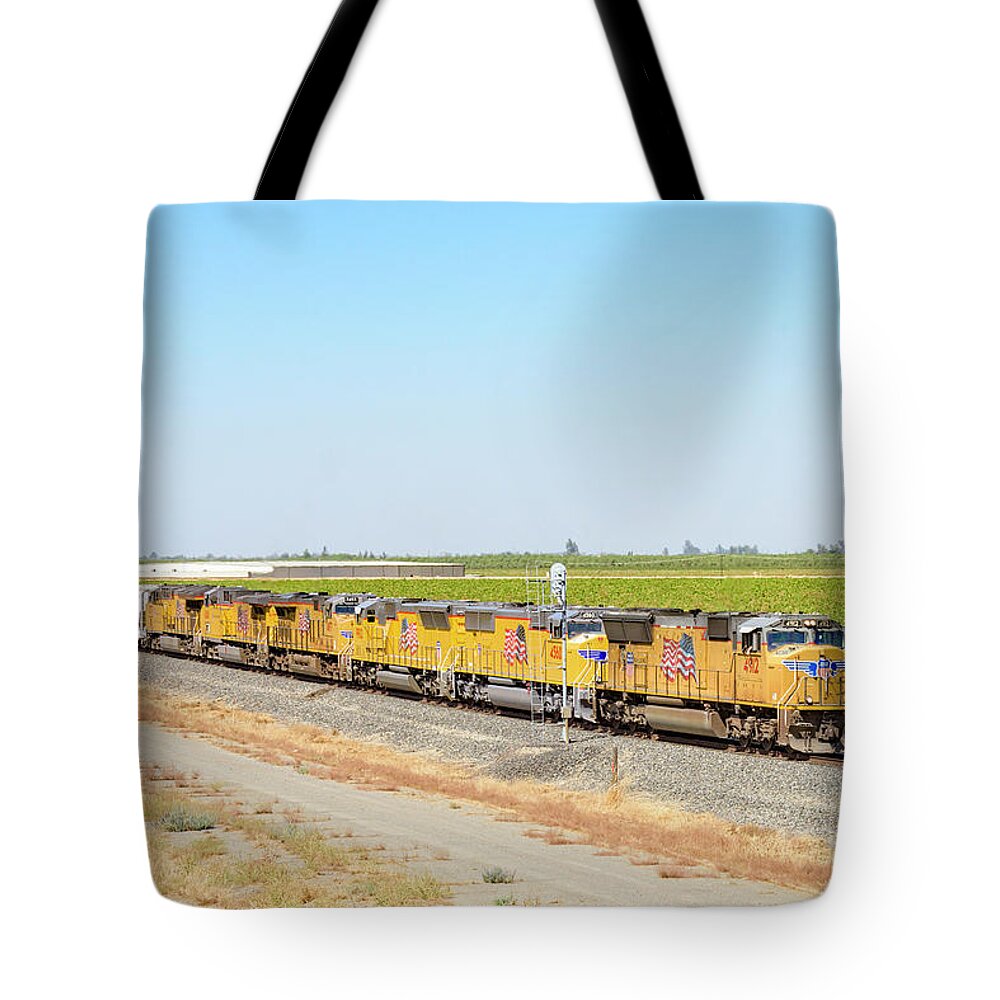Freight Trains Tote Bag featuring the photograph Up4912 by Jim Thompson