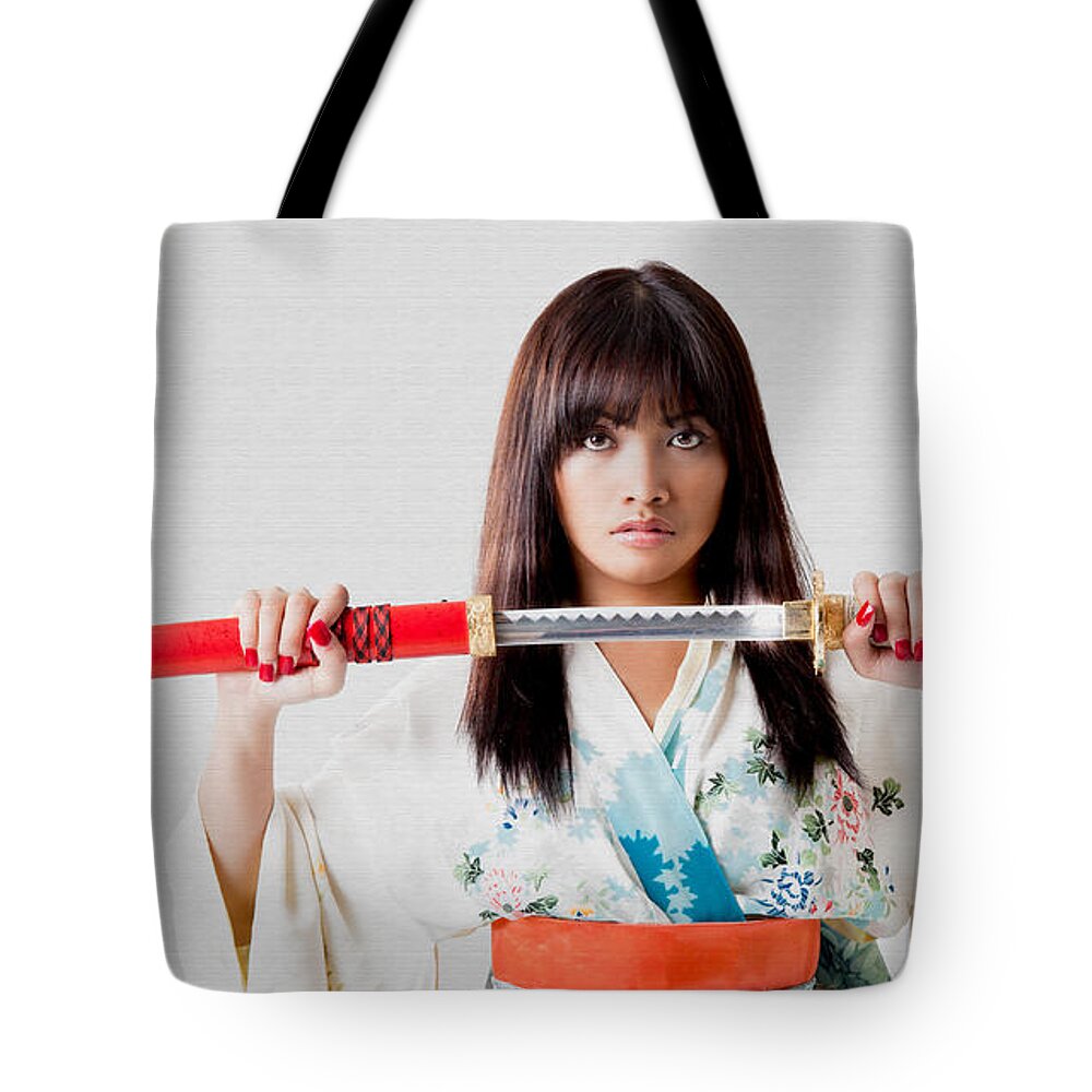Models Tote Bag featuring the photograph Vengeful Innocence by Rikk Flohr