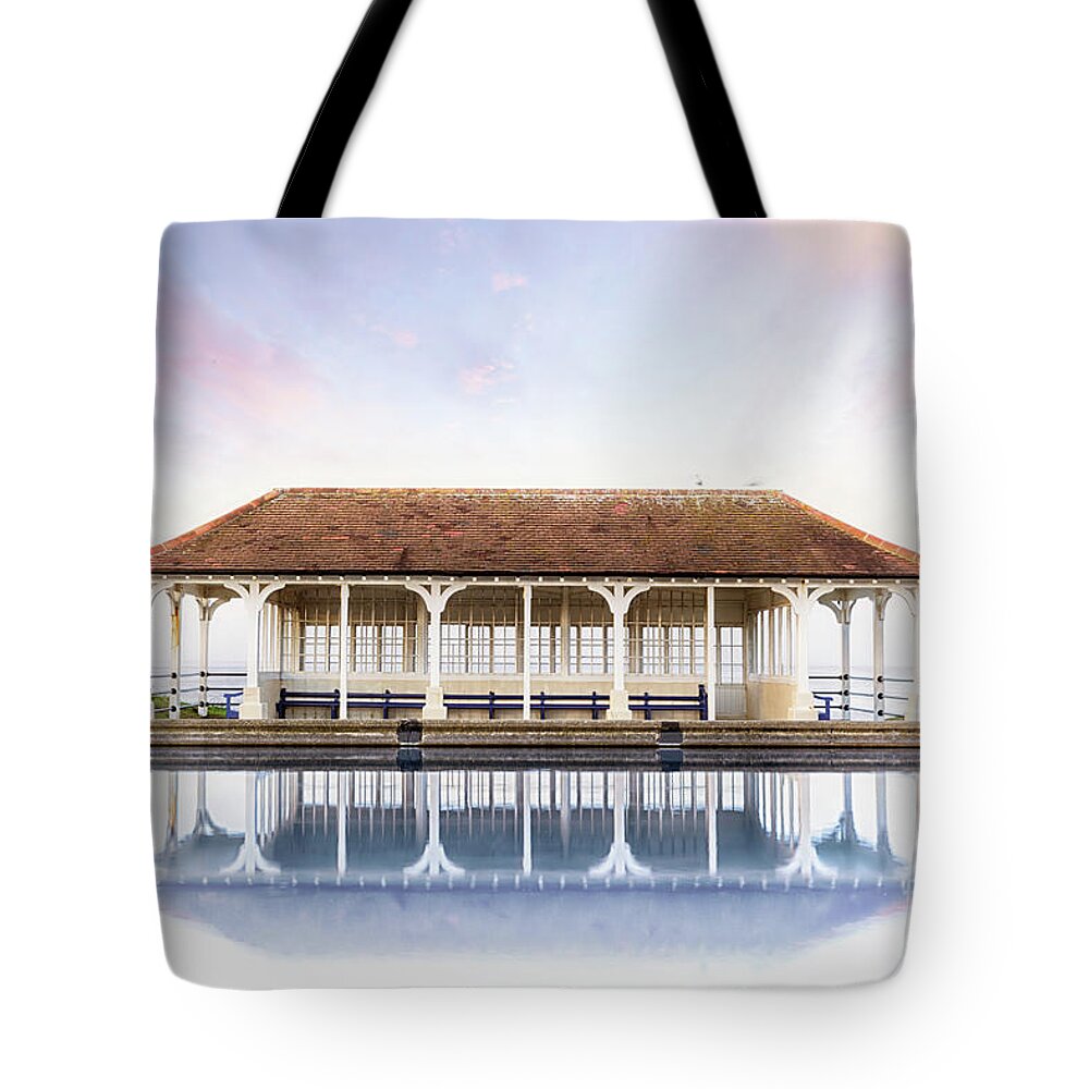 Sheringham Tote Bag featuring the photograph Norfolk victorian seaside shelter with pink sunset sky by Simon Bratt
