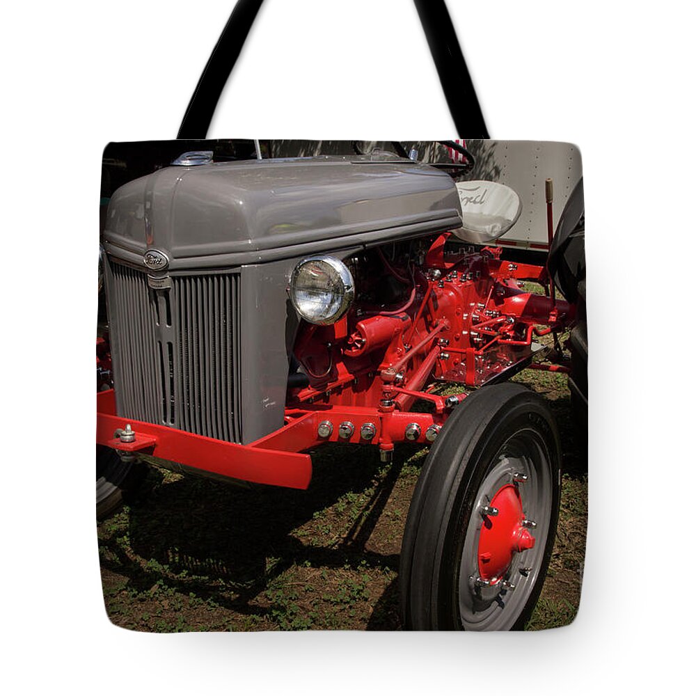 Tractor Tote Bag featuring the photograph Vintage Ford Tractor by Mike Eingle