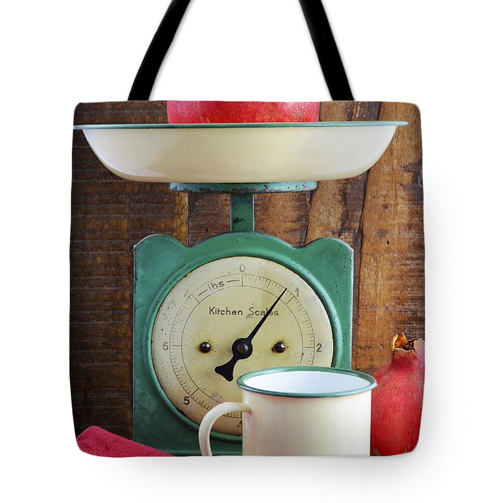 Analog Tote Bag featuring the photograph Vintage kitchen scales and tin cups and pans by Milleflore Images