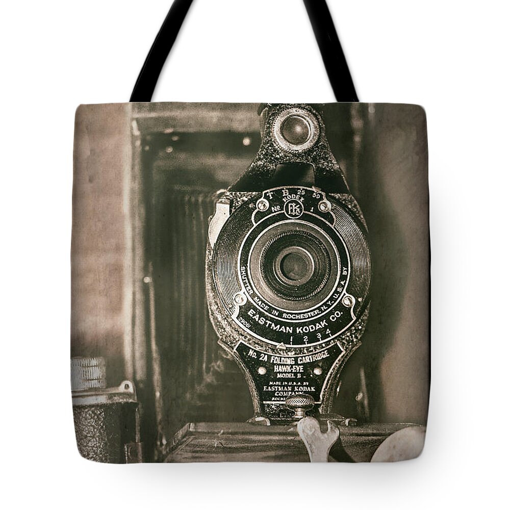Aged Tote Bag featuring the photograph Vintage Kodak Camera by Teresa Wilson