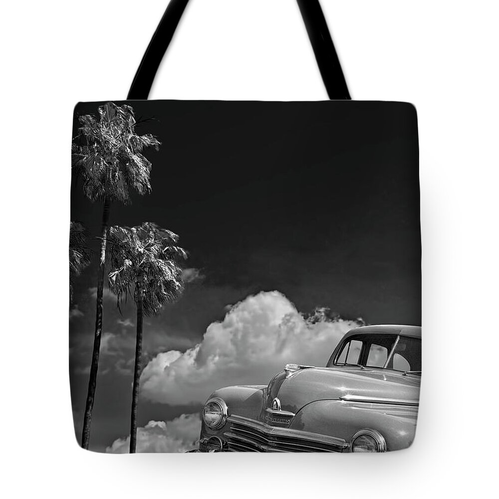 Car Tote Bag featuring the photograph Vintage Plymouth Automobile in Black and White against Palm Trees by Randall Nyhof
