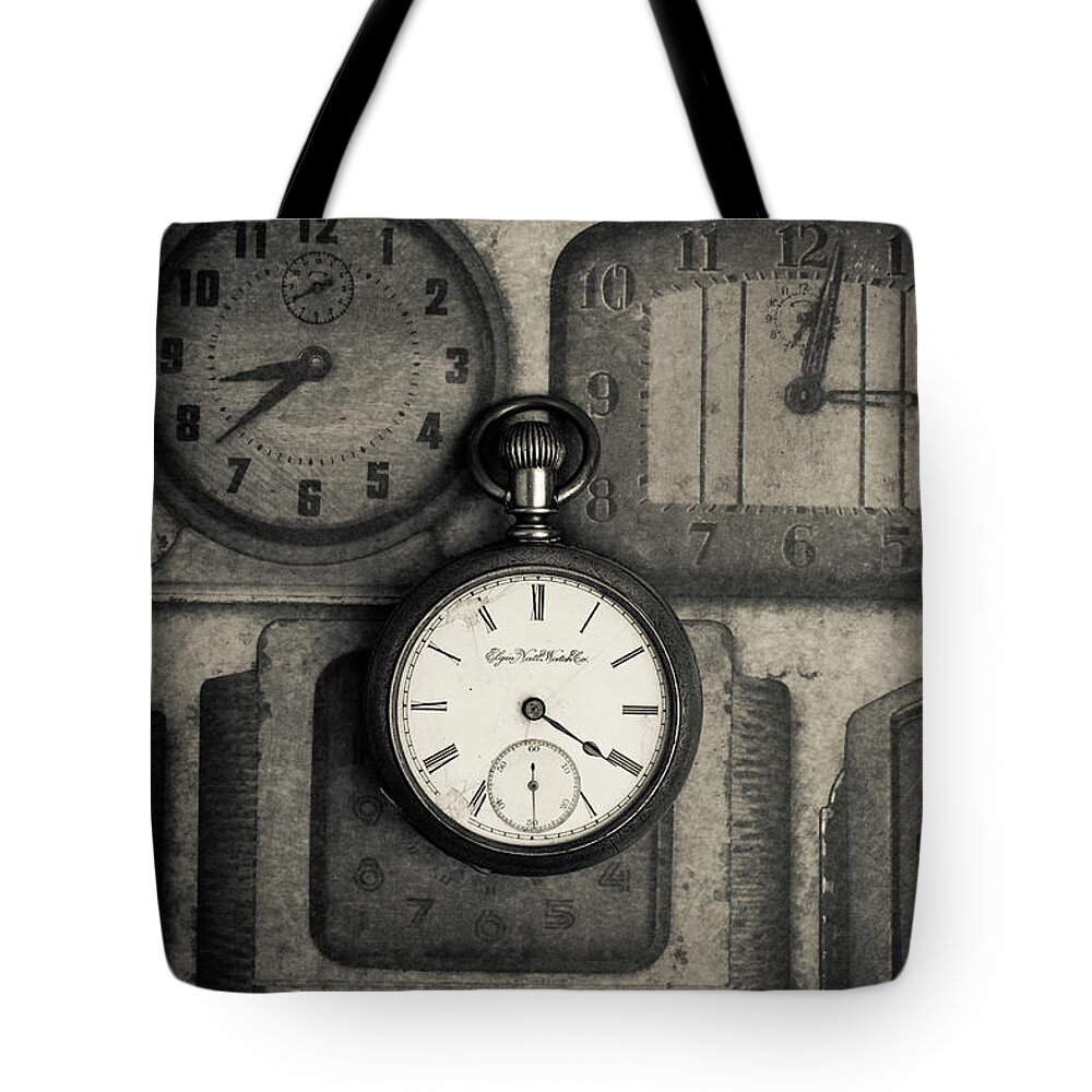 Still Life Tote Bag featuring the photograph Vintage Pocket Watch over Old Clocks by Edward Fielding