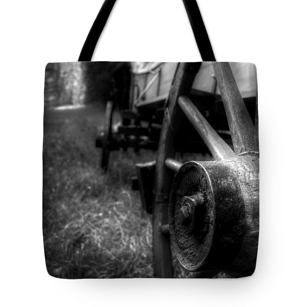 Wheel Tote Bag featuring the photograph Wagon Wheels in Black and White by Greg and Chrystal Mimbs