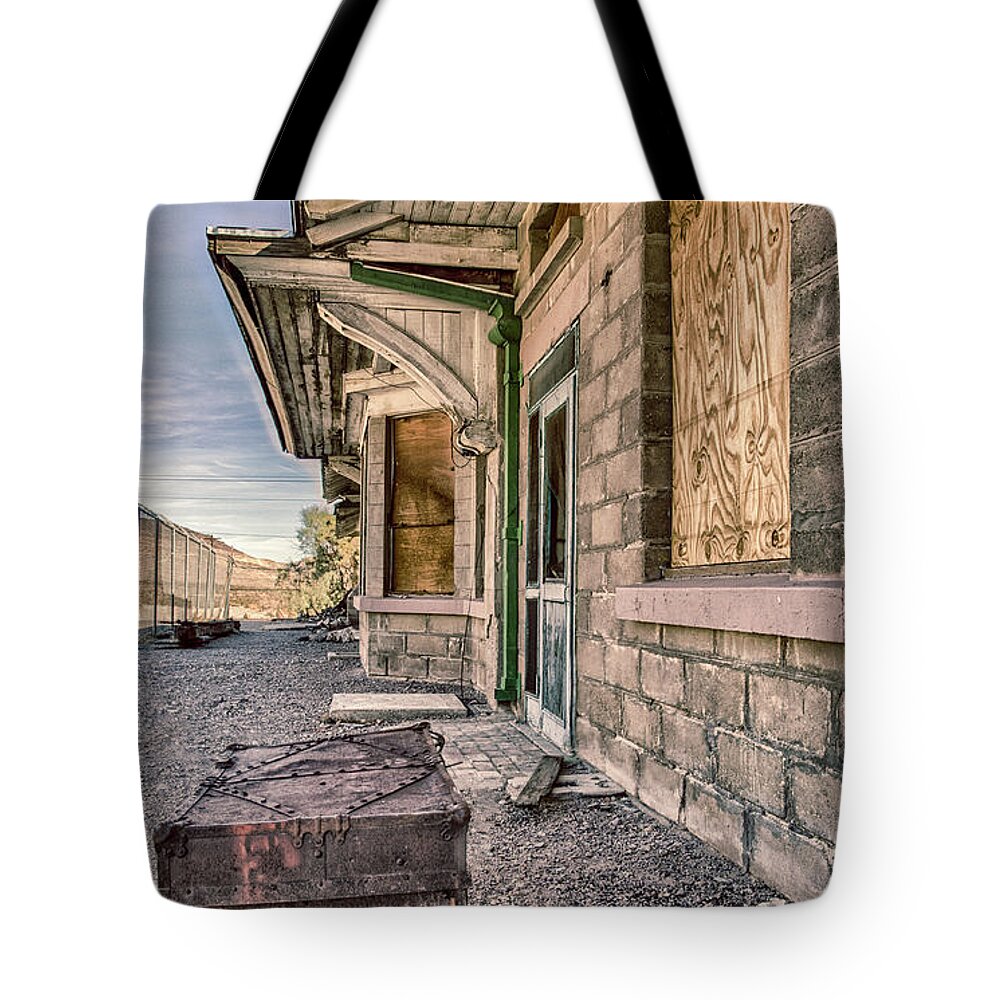 Rhyolite Tote Bag featuring the photograph Waiting for the train by Gaelyn Olmsted