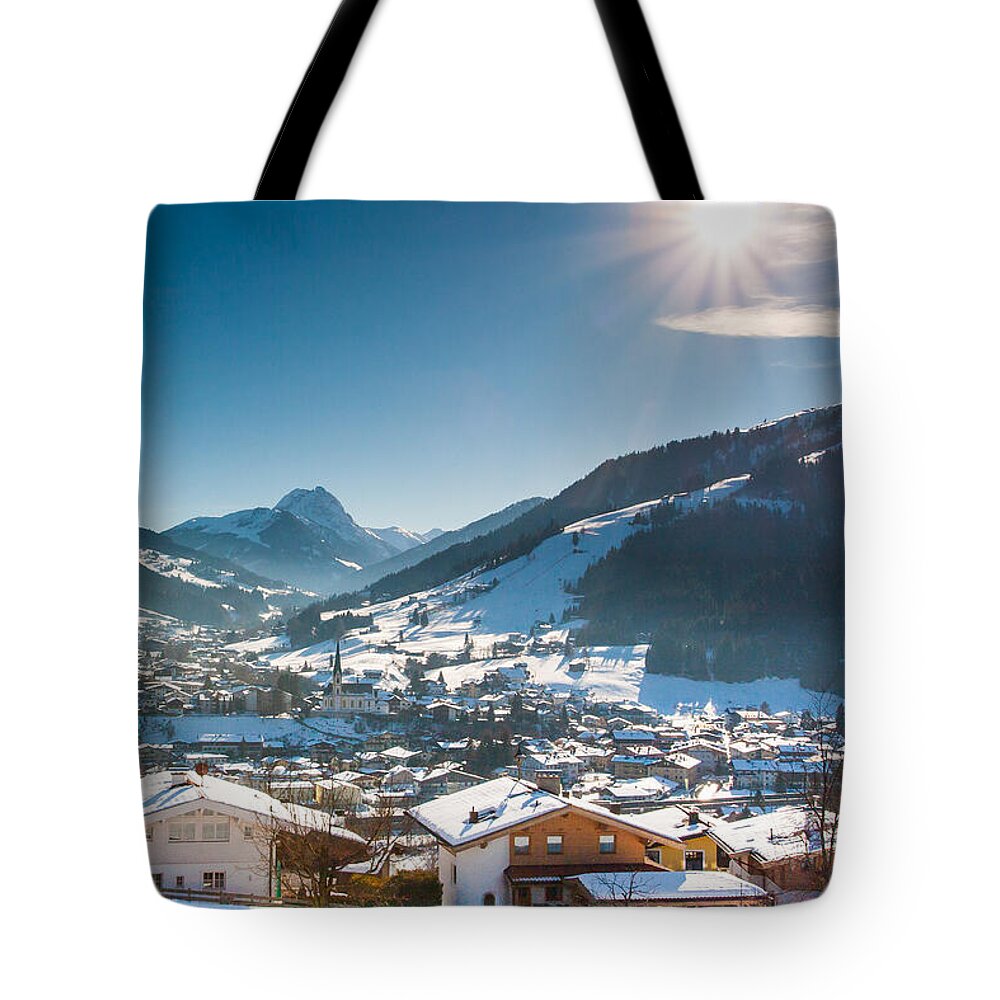 Austria Tote Bag featuring the photograph Warm winter day in Kirchberg town of Austria by John Wadleigh