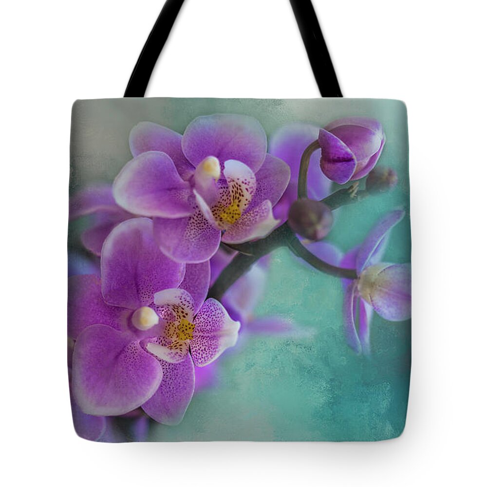 Orchid Tote Bag featuring the photograph Warms The Heart by Marvin Spates
