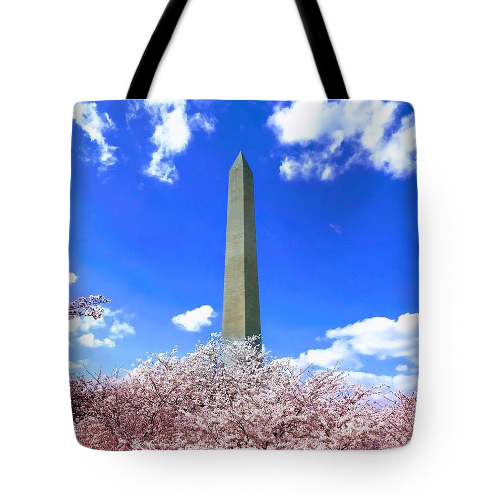Washington Monument Tote Bag featuring the photograph Washington Monument Cherry Blossoms by Chris Montcalmo