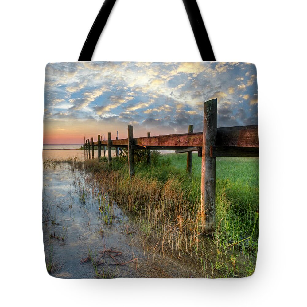 Clouds Tote Bag featuring the photograph Watching the Sun Rise by Debra and Dave Vanderlaan