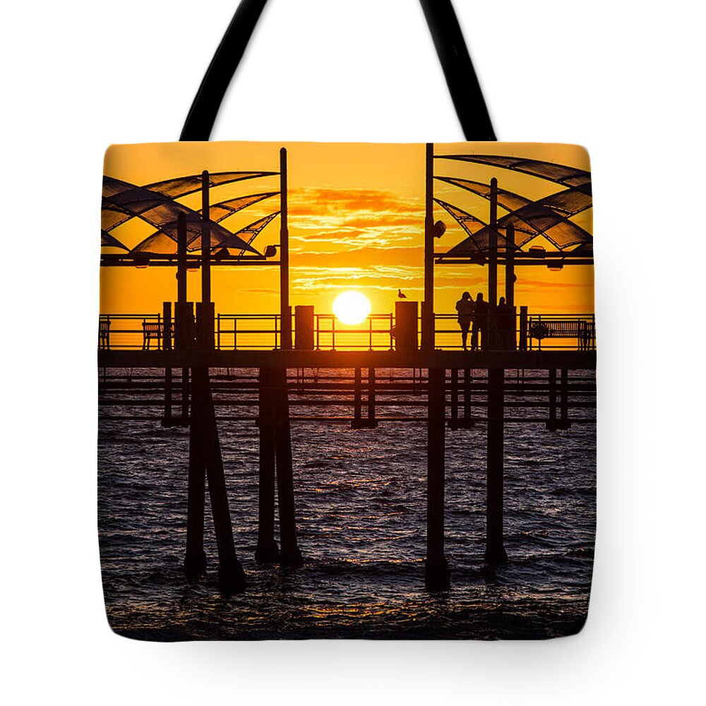 Redondo Beach Tote Bag featuring the photograph Watching the Sunset by Ed Clark