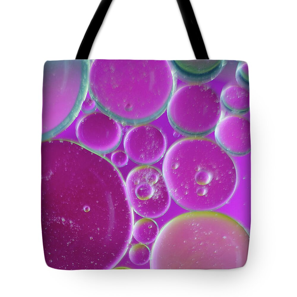 Water Tote Bag featuring the photograph Water and oil bubbles by Andy Myatt