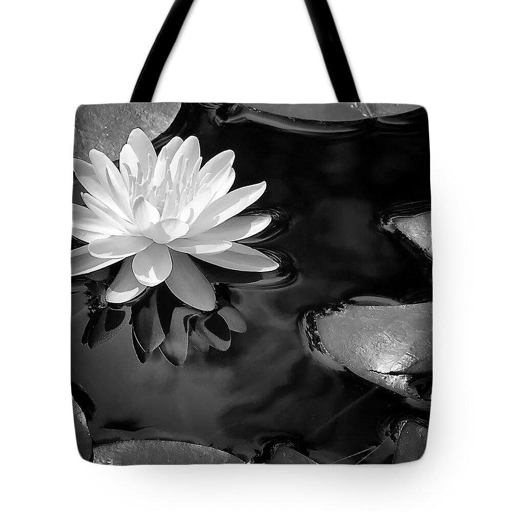 Water Lily Tote Bag featuring the photograph Water Lily by Peg Runyan