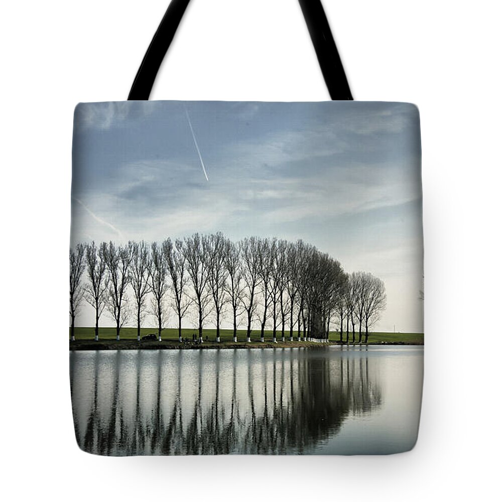 Water. Reflection Tote Bag featuring the photograph Water reflection by Daliana Pacuraru
