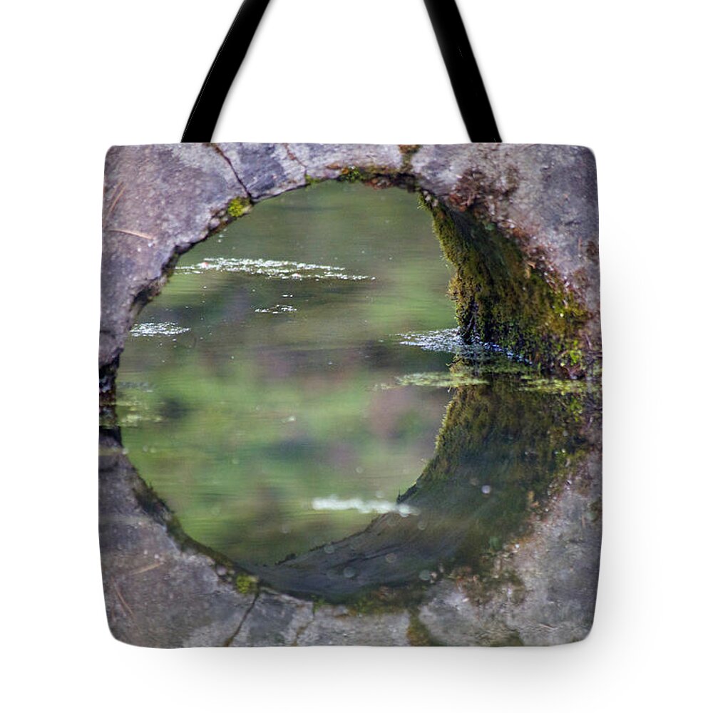 Abstract Tote Bag featuring the photograph Water Under the Bridge by Emerita Wheeling