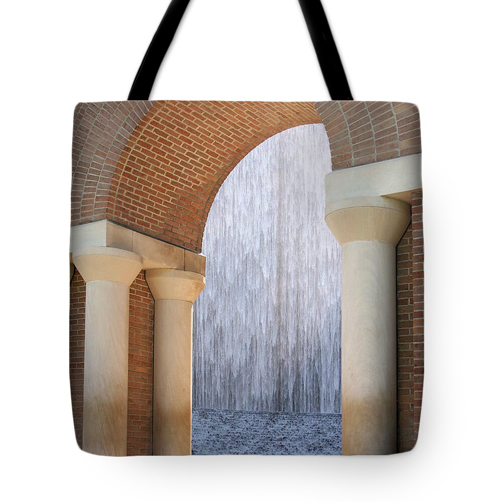 Houstonian Tote Bag featuring the photograph Waterwall and Arch 3 by Angela Rath