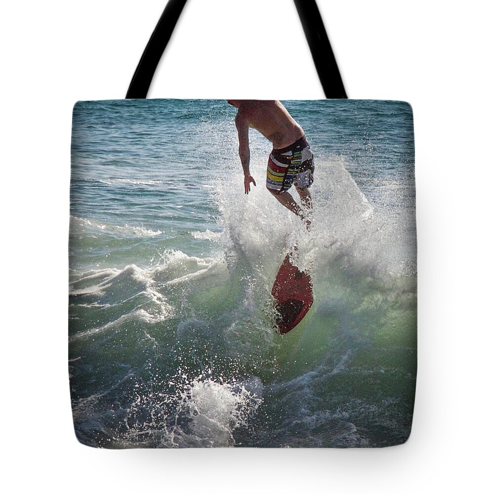 Wave Skimmer Tote Bag featuring the photograph Wave Skimmer by Jim Gillen