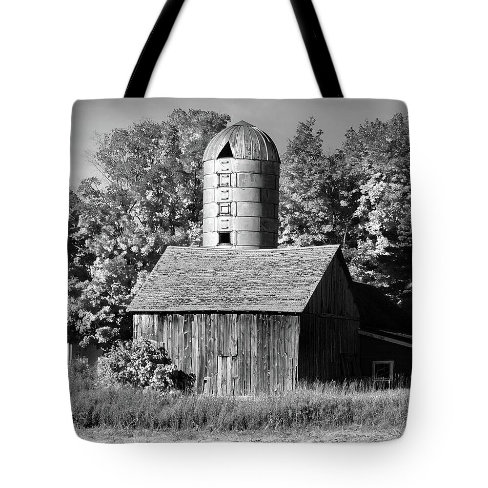 Silo Tote Bag featuring the photograph Weathered Barn and Silo B W by David T Wilkinson