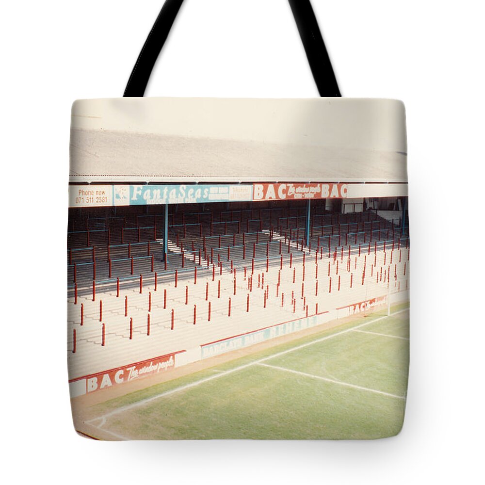 West Ham Tote Bag featuring the photograph West Ham - Upton Park - North Stand 1 - April 1991 by Legendary Football Grounds