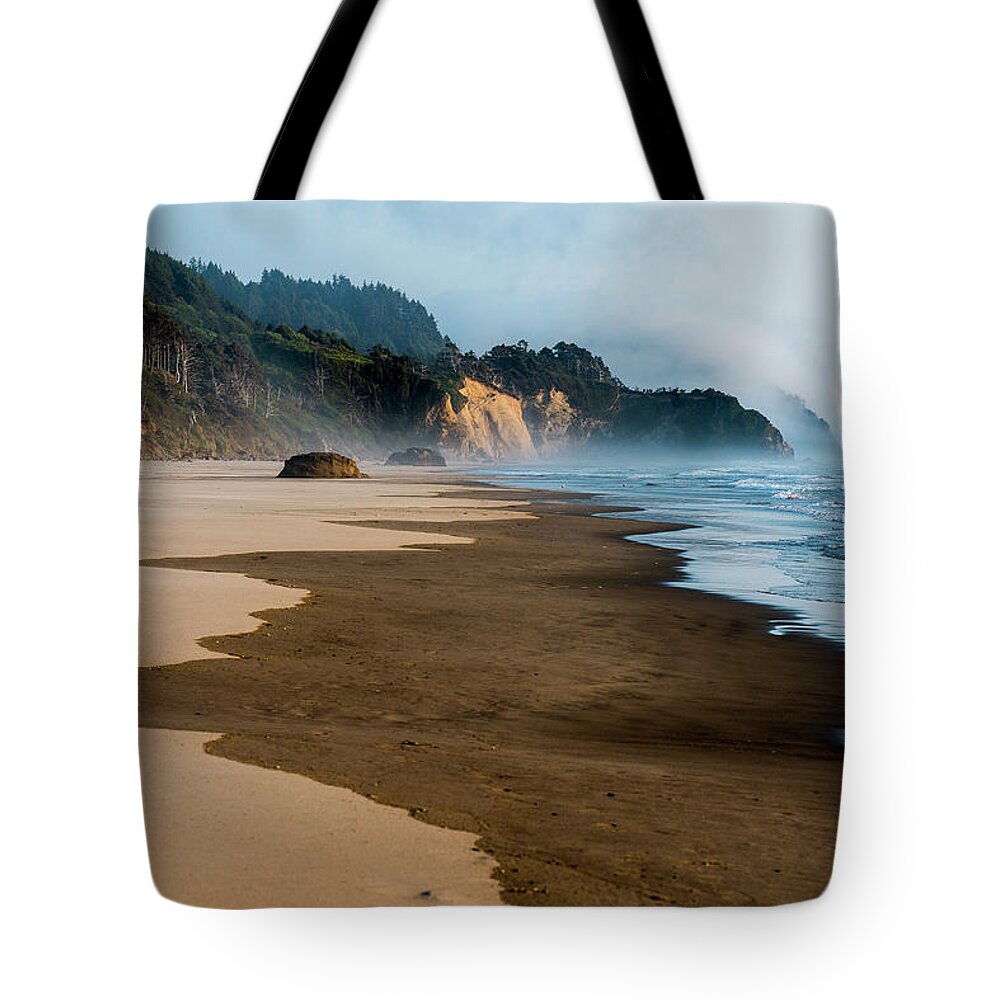 Arcadia Beach Tote Bag featuring the photograph Wet Sand by Robert Potts