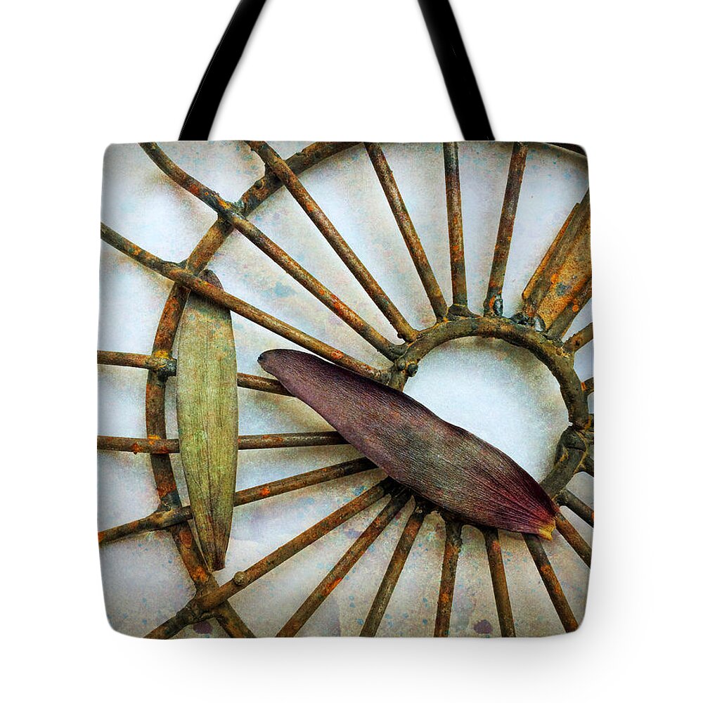 Wheel Tote Bag featuring the photograph Wheel and Leaves by Peggy Dietz