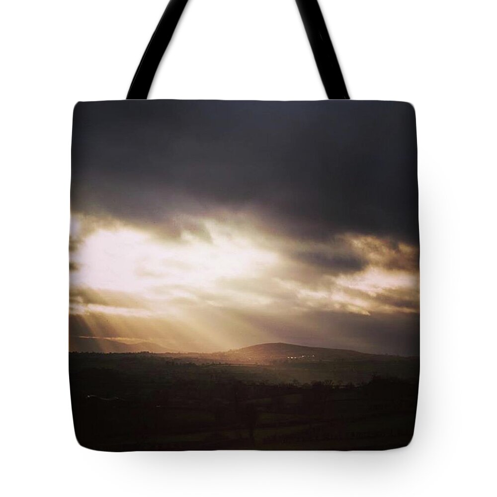 Beautiful Tote Bag featuring the photograph When The Light Breaks by Aleck Cartwright