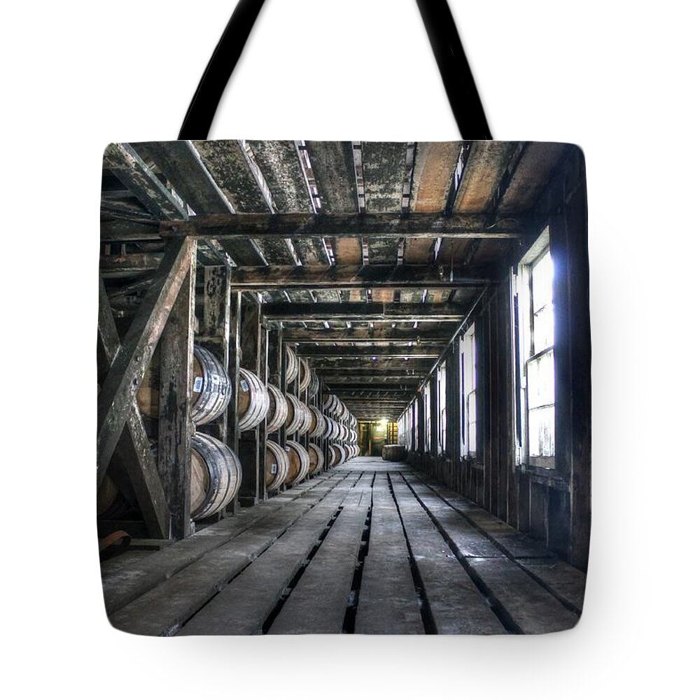 Bourbon Tote Bag featuring the photograph Whiskey Bourbon barrels wild turkey distillery kentucky by Jane Linders