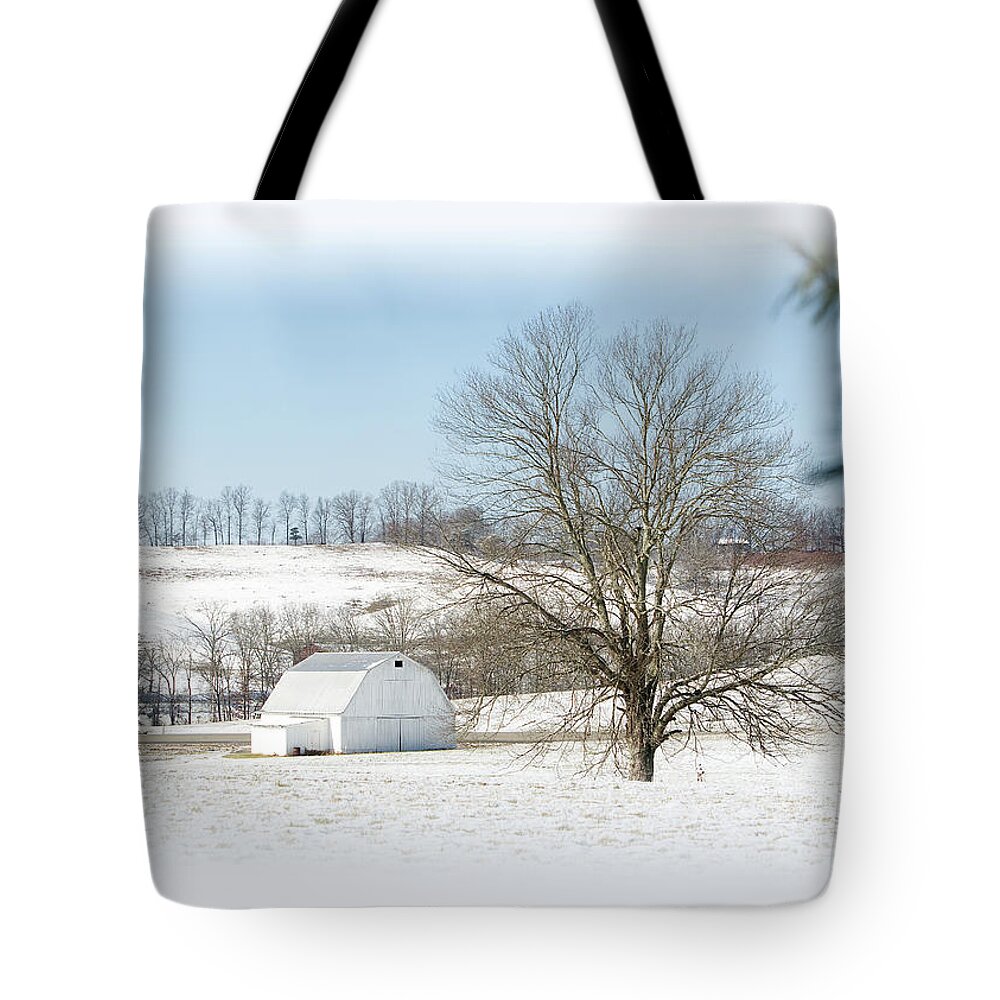 Snow Tote Bag featuring the photograph White Barn In Snow by Randall Evans