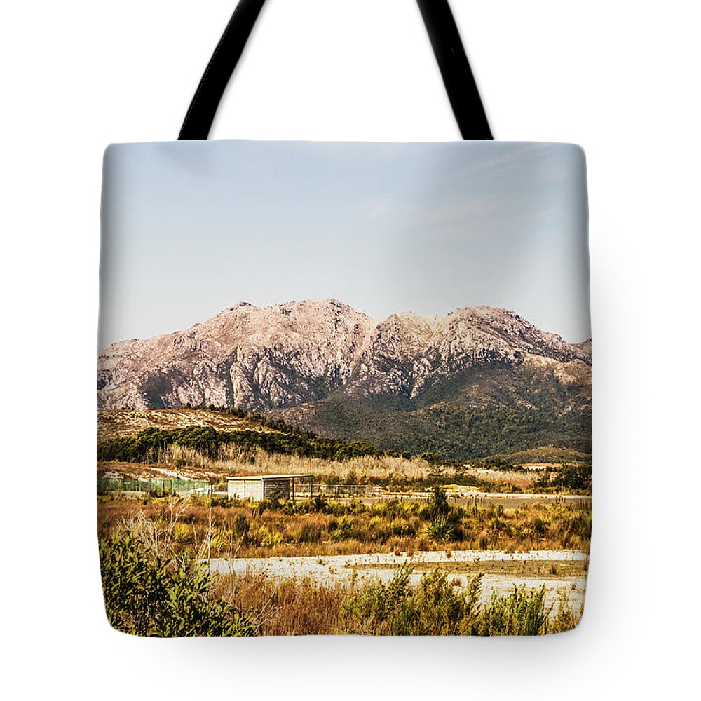 Tasmania Tote Bag featuring the photograph Wild mountain range by Jorgo Photography