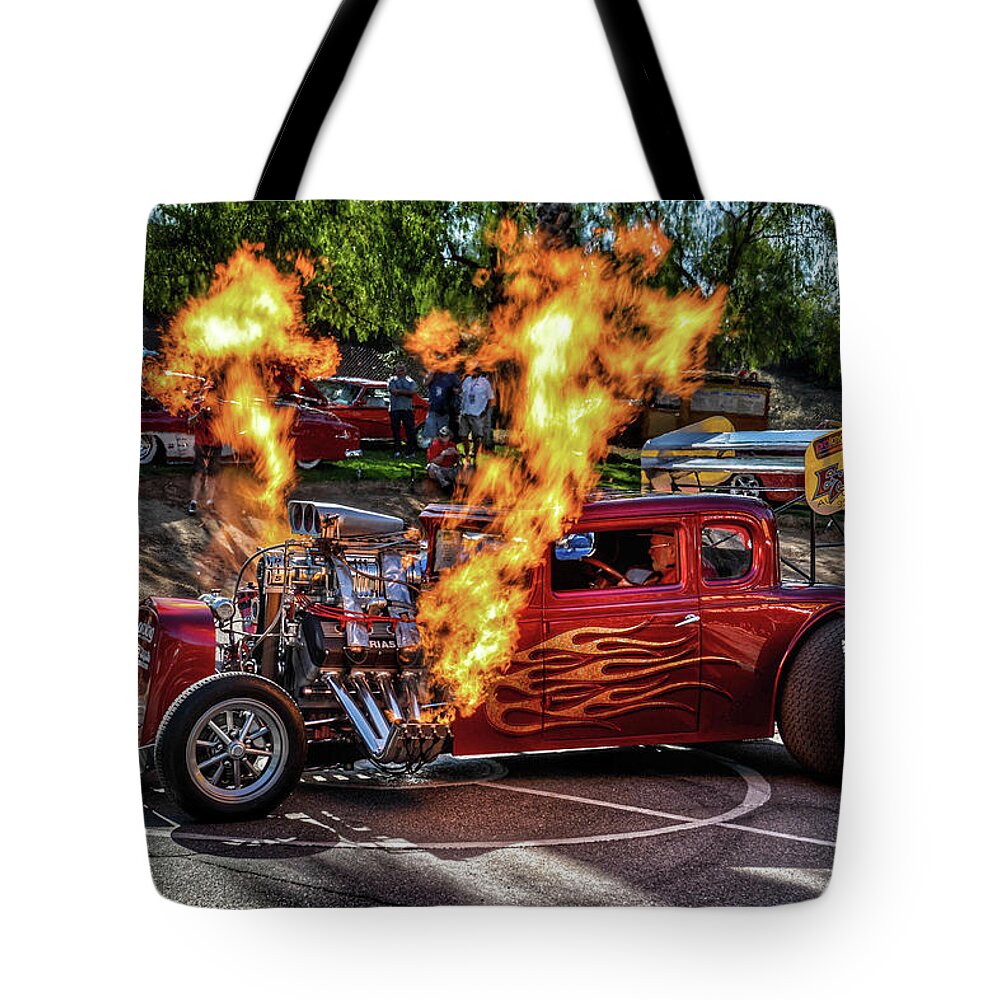Asphalt Animal Tote Bag featuring the photograph Wild Thang by Tommy Anderson