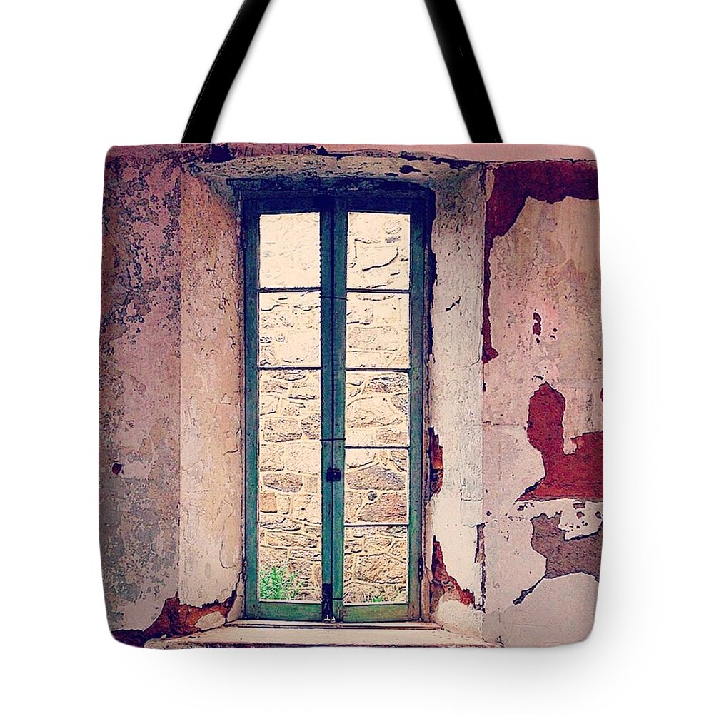 Penitentiary Tote Bag featuring the photograph Window in Eastern State Pennitentiary by Sharon Halteman