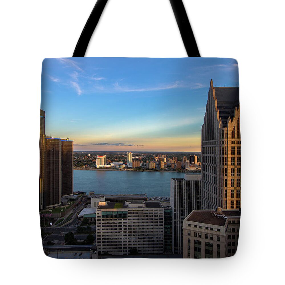 Detroit Tote Bag featuring the photograph Windsor skyline between Detroit's skyscrapers by Jay Smith
