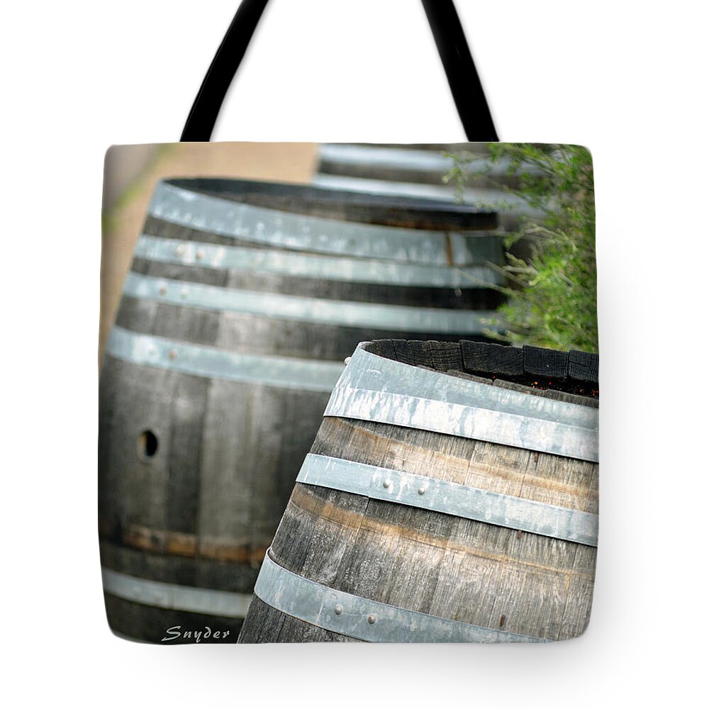Wine Barrels Tote Bag featuring the photograph Wine Barrels Foxen Winery by Barbara Snyder