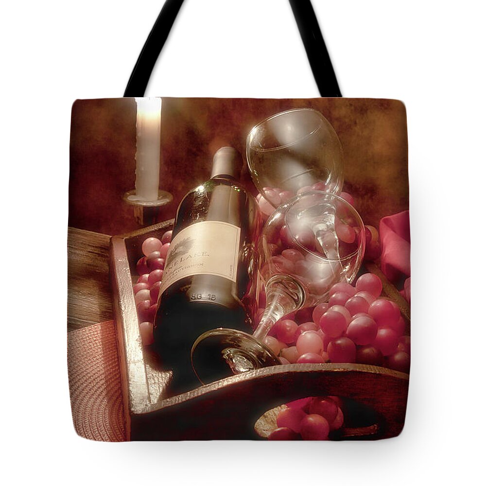 Alcohol Tote Bag featuring the photograph Wine by Candle Light II by Tom Mc Nemar