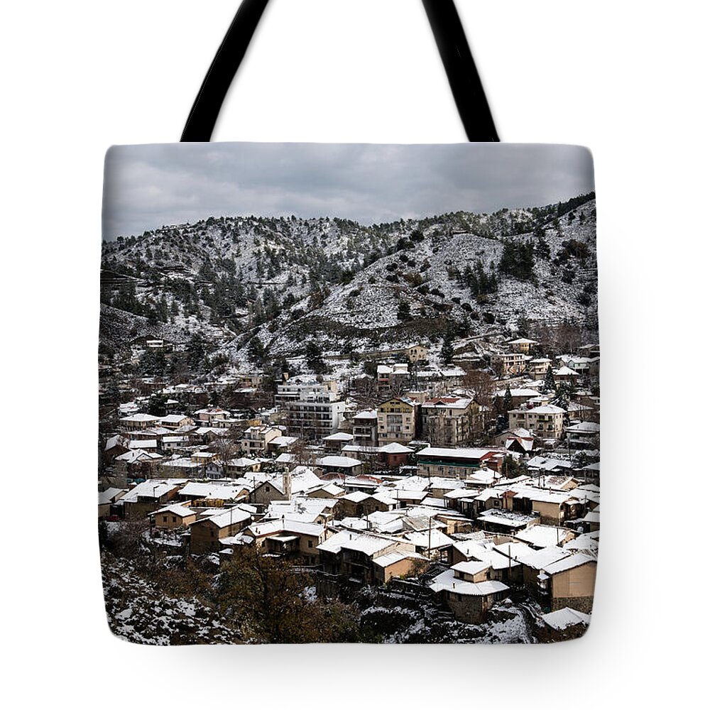 Winter Tote Bag featuring the photograph Winter mountain village landscape with snow by Michalakis Ppalis