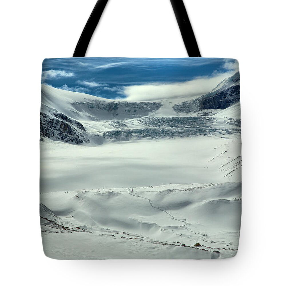 Columbia Icefield Tote Bag featuring the photograph Wispy Clouds Over The Athabasca Glacier by Adam Jewell