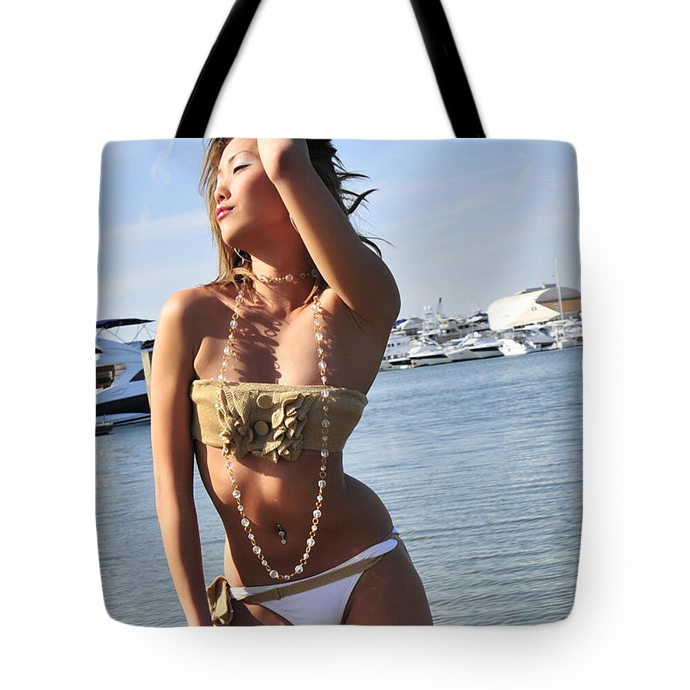 Glamour Photographs Tote Bag featuring the photograph Without a care by Robert WK Clark