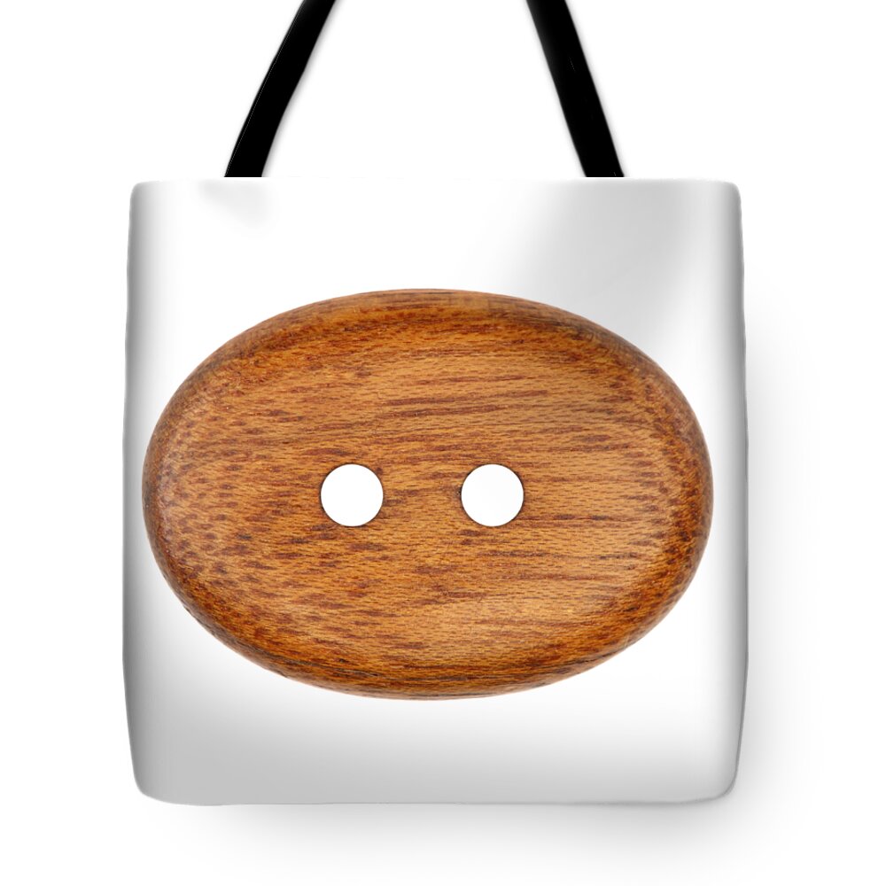 Button Tote Bag featuring the photograph Wooden button by Michal Boubin