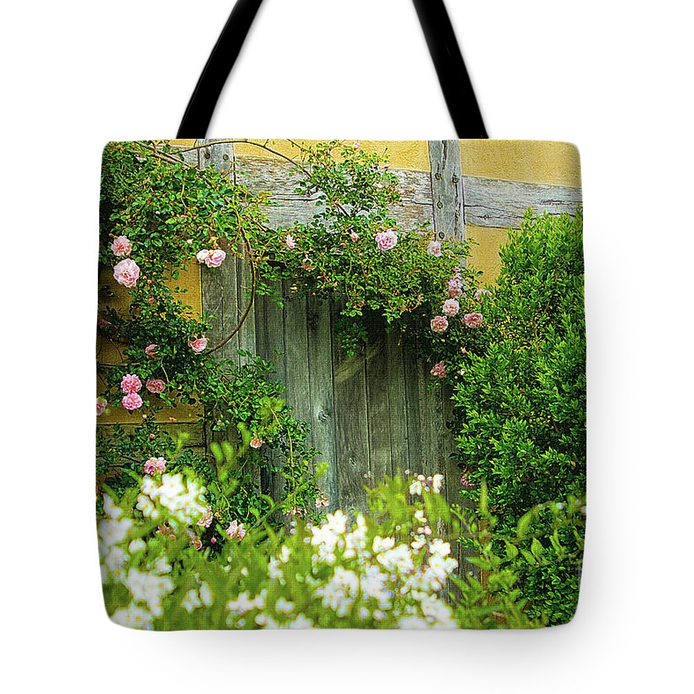 Vintage Tote Bag featuring the photograph Wooden Door Climbing Roses Secret Garden by Beverly Claire Kaiya