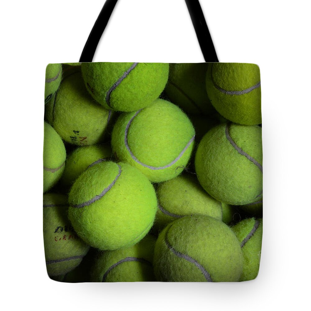 Paul Ward Tote Bag featuring the photograph Worn Out Tennis Balls by Paul Ward