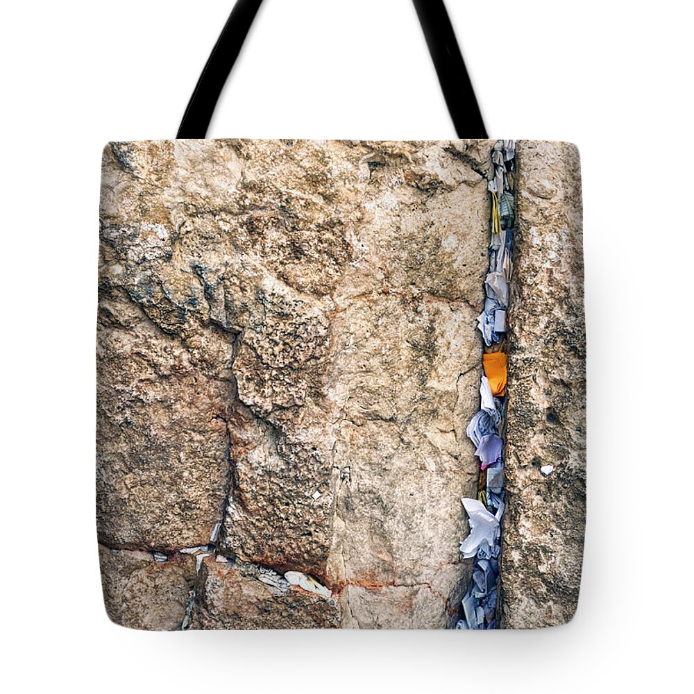 Israel Tote Bag featuring the photograph Written Prayers tucked into cracks Western Wall Jerusalem by Thomas R Fletcher