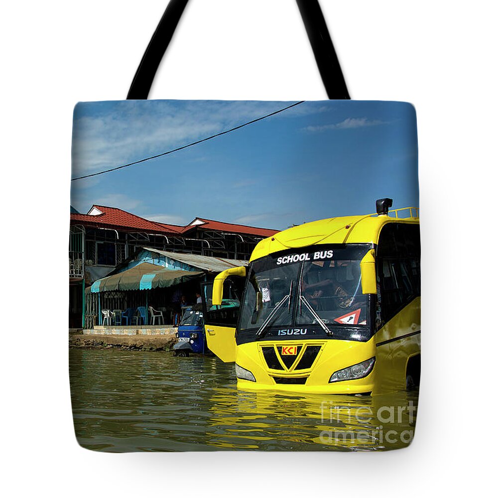 Lake Victoria Tote Bag featuring the photograph Yellow Bus Wash by Morris Keyonzo