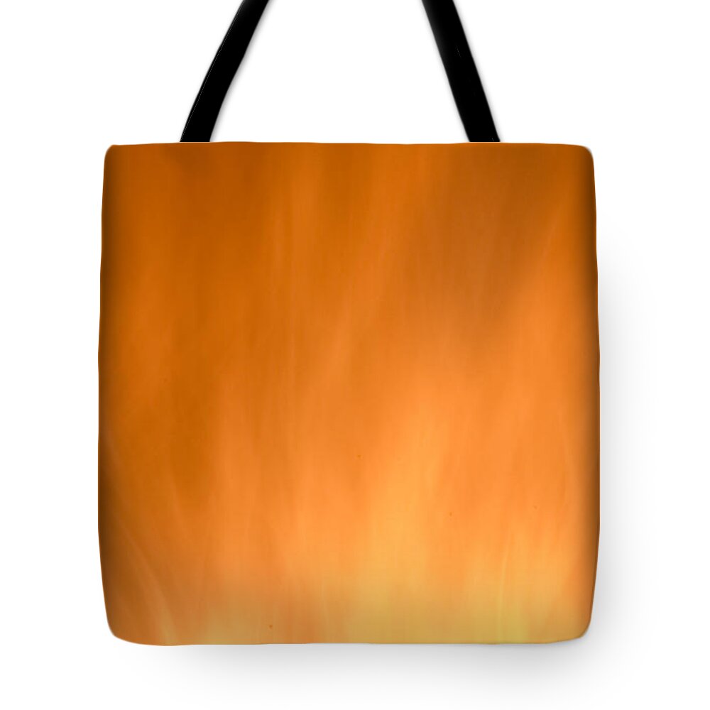 Fire Background Tote Bag featuring the photograph Yellow Fire background by Michalakis Ppalis