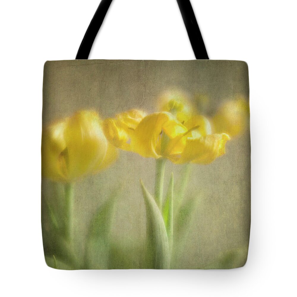 Yellow Tulips Tote Bag featuring the photograph Yellow Tulips by Elena Nosyreva