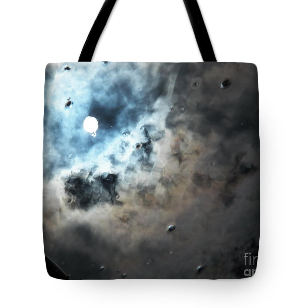 Clouds Tote Bag featuring the photograph You'll Never Know by Brian Commerford