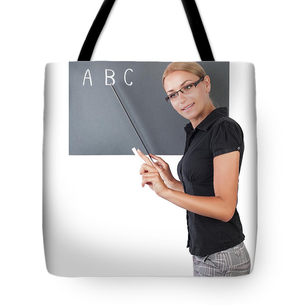 Back To School Tote Bag featuring the photograph Young pretty teacher by Anna Om
