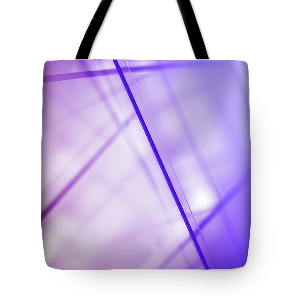 Purple Tote Bag featuring the photograph Abstract Intersecting Lines On A Glass #1 by Ralf Hiemisch
